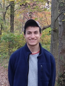 Photo Of Benjamin Notis In Front Of Trees